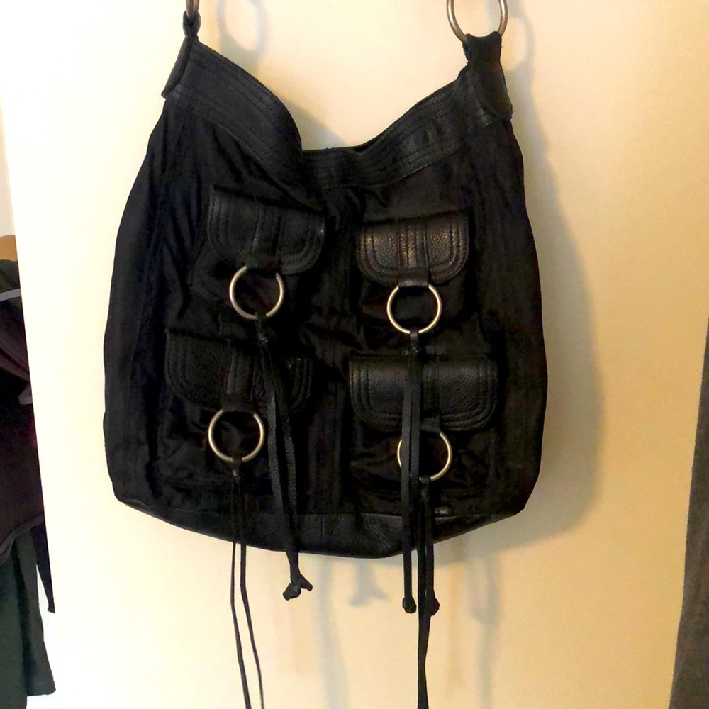 Large black satchel with leather straps